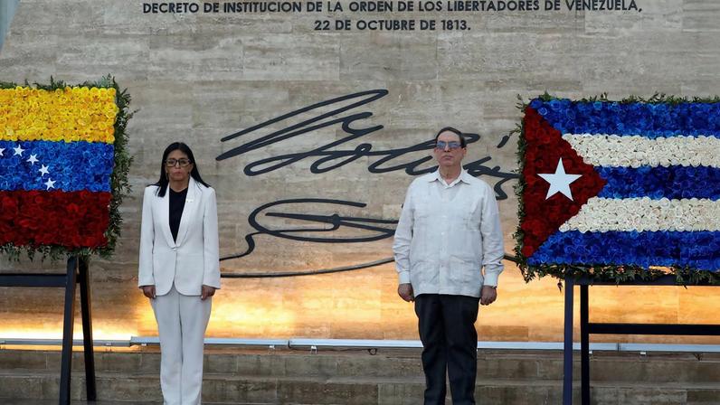 Venezuela's interim president Delcy Rodriguez and Cuban Foreign Minister, Bruno Rodriguez Padilla attend the ceremony "Promotions and Decorations for Heroes and Martyrs", honouring Venezuelan and Cuban military and security personnel who died during a U.S. operation to capture Venezuela's President Nicolas Maduro and his wife Cilia Flores, in Caracas, Venezuela January 8, 2026. REUTERS/Leonardo Fernandez Viloria/File Photo