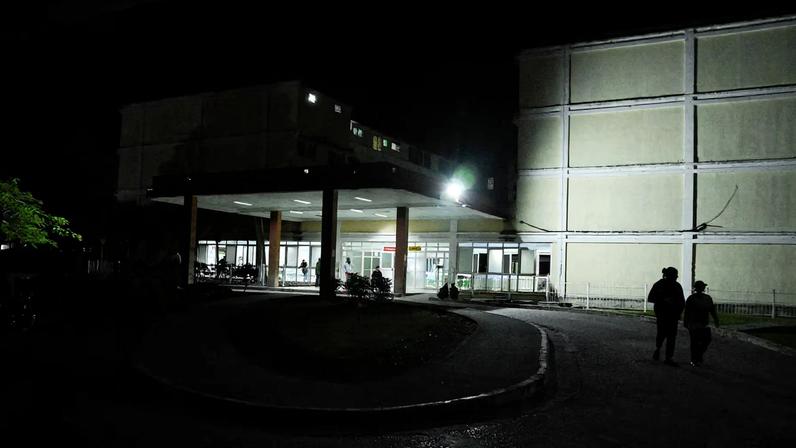 People approach the entrance of the Provincial Clinical–Surgical Hospital "Arnaldo Milian Castro," where, according to local information, injured people were being treated after an armed incident involving a Florida-registered speedboat and a Cuban patrol, at a time of heightened tensions with the United States, in Santa Clara, Cuba, February 25, 2026. REUTERS/Norlys Perez TPX IMAGES OF THE DAY