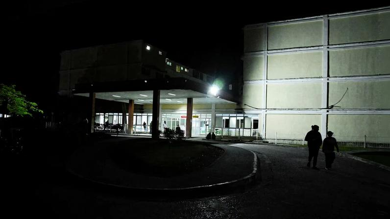 People approach the entrance of the Provincial Clinical–Surgical Hospital "Arnaldo Milian Castro," where, according to local information, injured people were being treated after an armed incident involving a Florida-registered speedboat and a Cuban patrol, at a time of heightened tensions with the United States, in Santa Clara, Cuba, February 25, 2026. REUTERS/Norlys Perez