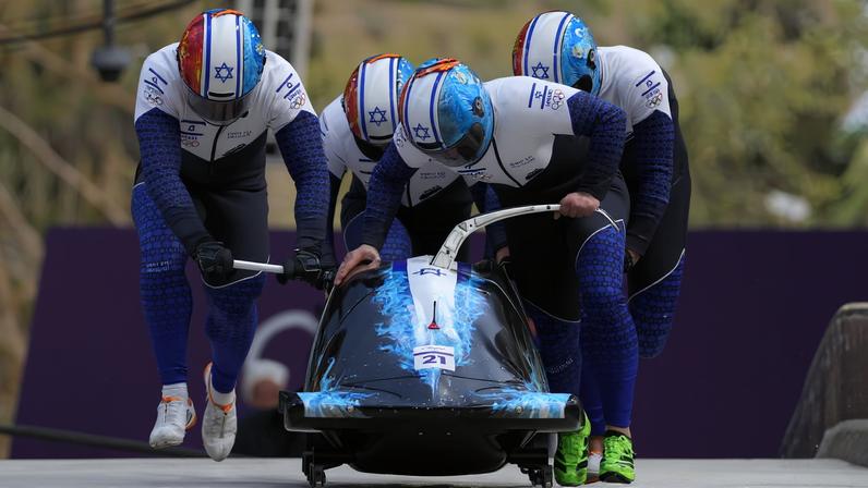 Milano Cortina 2026 Olympics - Bobsleigh - 4-man Heat 1 - Cortina Sliding Centre, Cortina d'Ampezzo, Italy - February 21, 2026. Adam Edelman of Israel, Menachem Chen of Israel, Uri Zisman of Israel, Omer Katz of Israel in action during Heat 1.