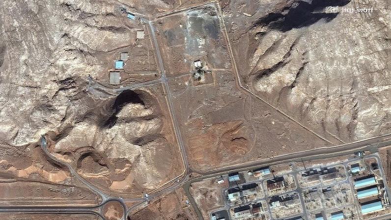 A satellite image shows un‑buried tunnel entrances at Isfahan nuclear complex