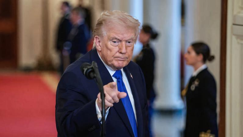 U.S. President Donald Trump gestures at the end of an event to honor "Angel Families" who have lost family members to crimes committed by people in the country illegally, at the White House in Washington, D.C., U.S., February 23, 2026.