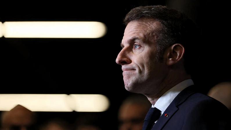 French President Emmanuel Macron speaks to members of the media as he attends the opening day and inauguration of the 62nd International Agricultural Fair (Salon de l'Agriculture) at the Paris...