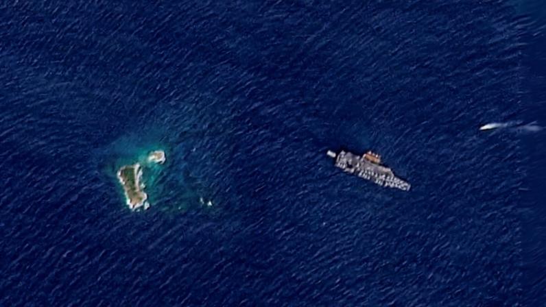 A satellite image shows the USS Gerald R. Ford off the coast of St Thomas Island