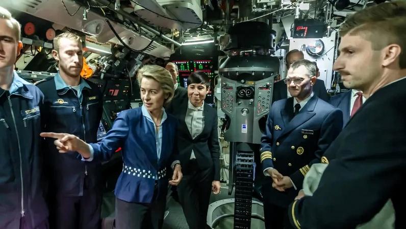 German Defence Minister Ursula von der Leyen and her Norwegian counterpart Ine Marie Eriksen Soreide stand inside the operations room of German submarine U34 during a joint visit of the naval base of the German Federal army in Eckernfoerde, northern Germany, on August 22, 2017.
