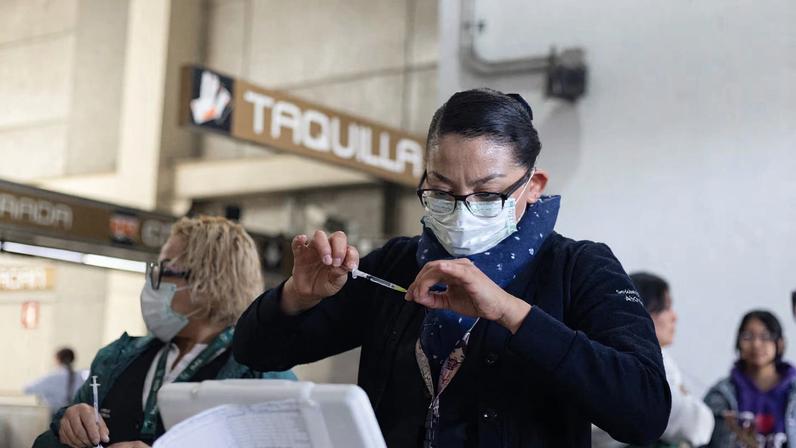 Healthcare workers prepare measles vaccine as health authorities in Mexico launch vaccination campaigns to curb the surge in cases and prevent wider regional transmission, at the Culhuacan metro station in Mexico City, Mexico, February 9, 2026.
