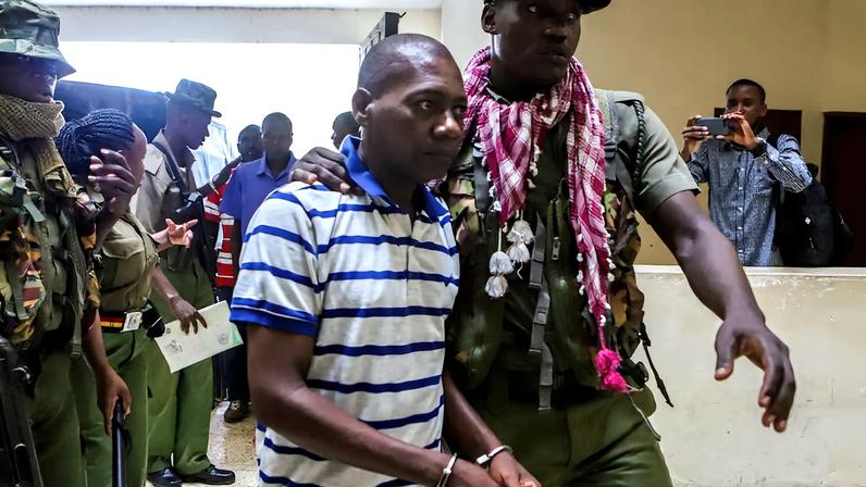 Paul Mackenzie, a Kenyan cult leader accused of ordering his followers, who were members of the Good News International Church, to starve themselves to death in Shakahola forest, is escorted to the Malindi Law Courts