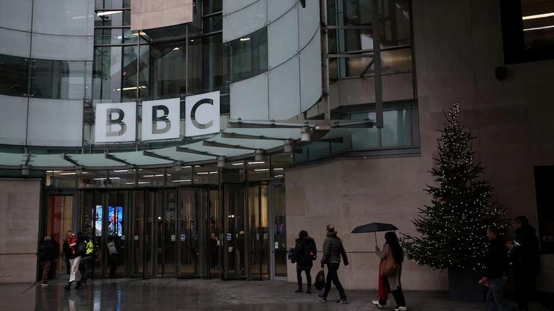 People walk outside the BBC Broadcasting House, after U.S. President Donald Trump sued the BBC for up to $10 billion in damages over edited clips of a speech, in London, Britain, December 16, 2025. REUTERS/Isabel Infantes