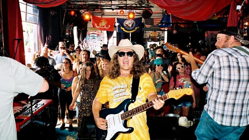 Johnny Mullenax is a rising star on the Red Dirt scene, known for weed-smoking, swearing, and playing a weekly brunch showcase.