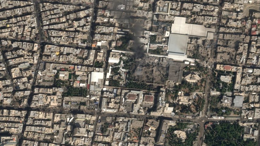 A satellite image shows black smoke rising and heavy damage at Iranian Supreme Leader Ayatollah Ali Khamenei's compound in Tehran
