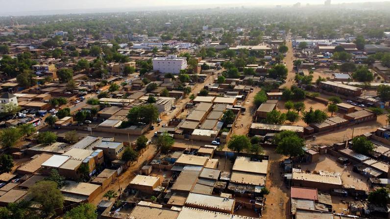 A drone picture shows a suburb following the attack on the international airport in Niamey