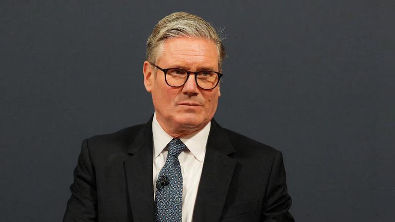 Britain's Prime Minister Keir Starmer looks on during a press conference at the UK-EU summit at Lancaster House on May 19, 2025 in London, England. Carl Court/Pool via REUTERS