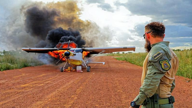 A small airplane used for illegal mining set on fire by IBAMA inspectors in the Yanomami Indigenous Territory. Image courtesy of IBAMA.