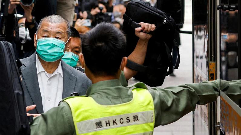 Media mogul Jimmy Lai, founder of Apple Daily, leaves the Court of Final Appeal by prison van in Hong Kong