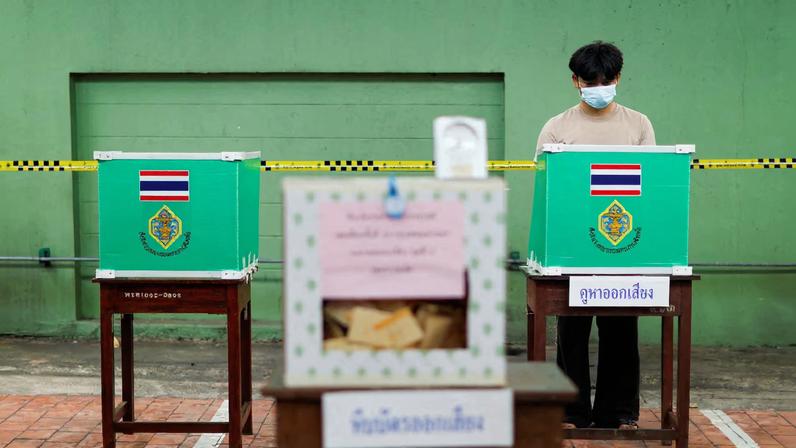 A person votes during the general elections at a polling station in Bangkok, Thailand, February 8, 2026. REUTERS/Patipat Janthong/File Photo