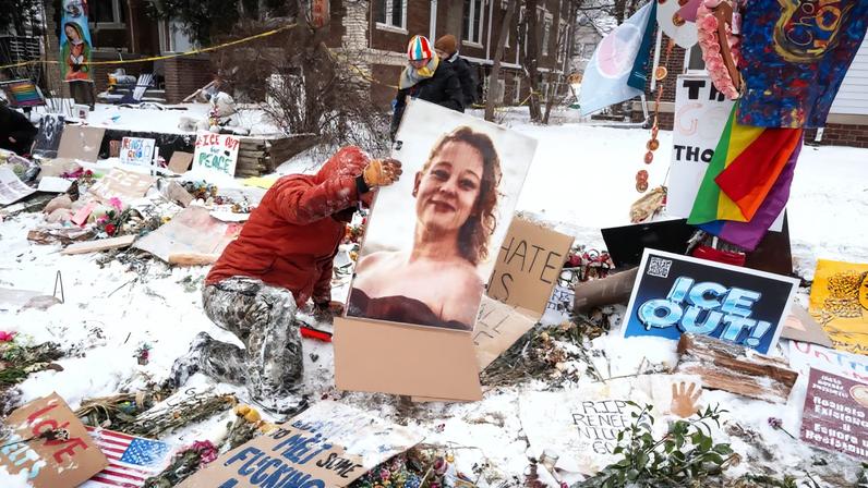 MINNEAPOLIS MINNESOTA FEBRUARY 01 Snow falls as people visit a memorial dedicated to Renee Good on February 01 2026 in...