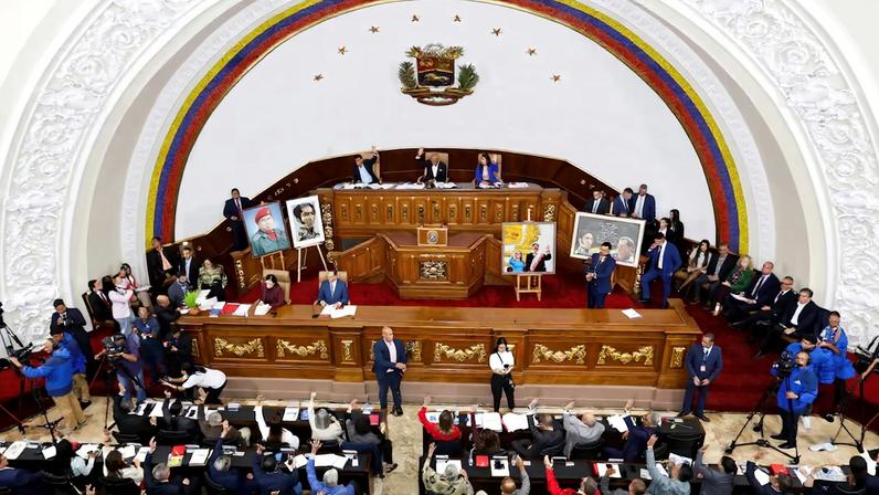 Members of the Venezuela's National Assembly and its president Jorge Rodriguez vote during a debate on an amnesty law meant to grant immediate clemency to individuals jailed for participating in political protests, as the legislation, which has already passed its first vote, requires a second successful vote to pass, in Caracas, Venezuela February 19, 2026. REUTERS/Fausto Torrealba