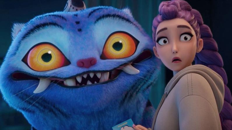 Rumi looks surprised at something behind her next to a giant tiger.