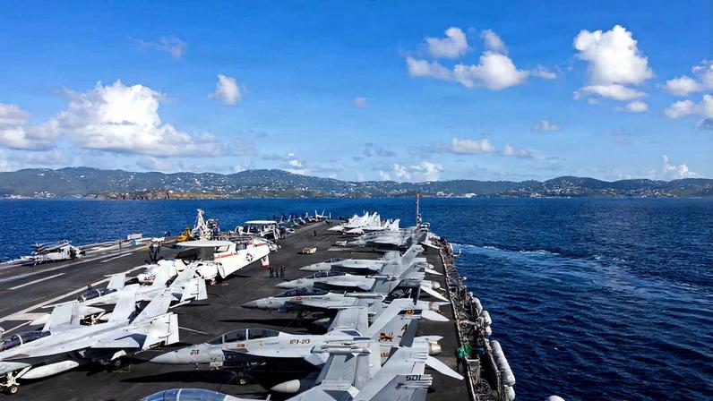 The world's largest aircraft carrier, the U.S. Navy nuclear-powered Ford-class aircraft carrier USS Gerald R. Ford (CVN 78) arrives in St. Thomas, U.S. Virgin Islands, December 1, 2025.