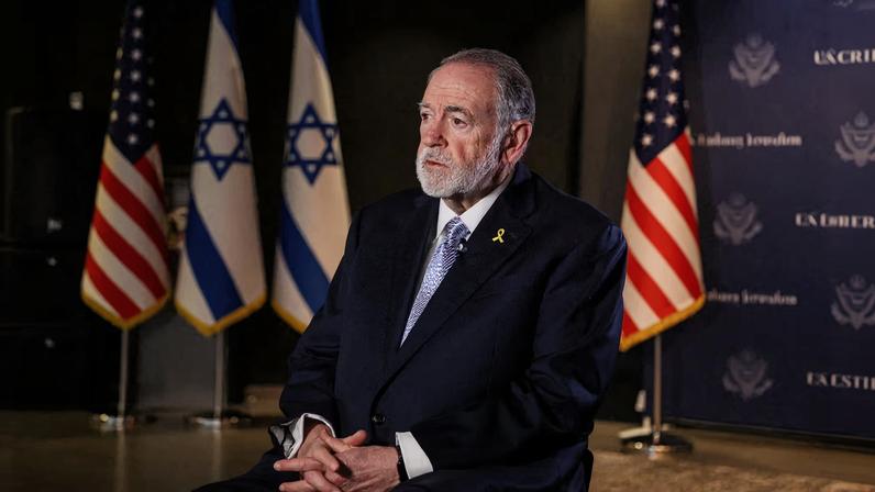 U.S. Ambassador to Israel Mike Huckabee looks on during an interview with Reuters in Jerusalem, September 10, 2025. REUTERS/Ronen Zvulun/File Photo