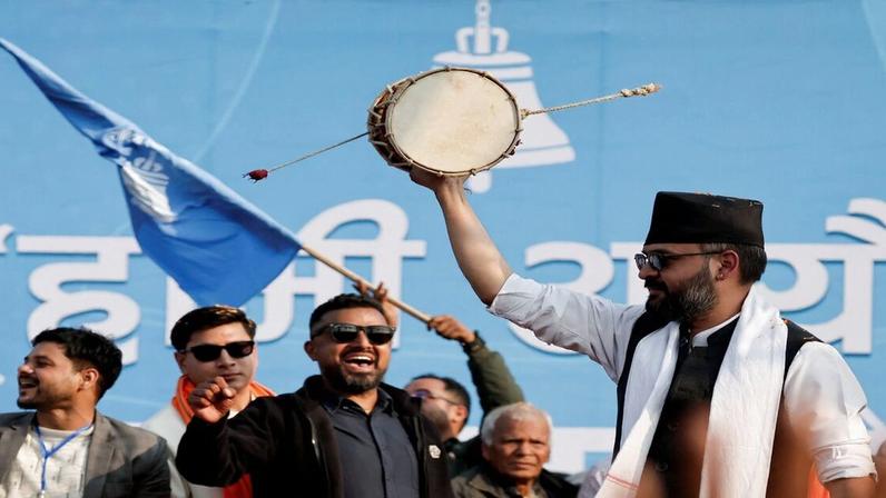 Balendra Shah, former mayor of Kathmandu popularly known as "Balen", who according to party officials, will become prime minister under an internal agreement if the Rastriya Swatantra Party (RSP) wins the March 5 elections, plays a "damru" percussion instrument during an election campaign in Janakpur, Nepal, January 19, 2026. REUTERS/Navesh Chitrakar
