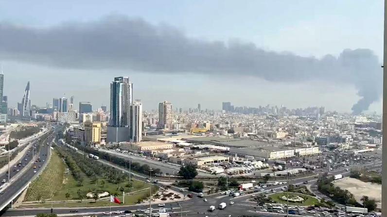 Smoke rises after the state news agency reported missile attack on the service center of the U.S. Fifth Fleet, following strikes by the United States and Israel against Iran, in Manama, Bahrain February 28, 2026, in this still image obtained from a video.