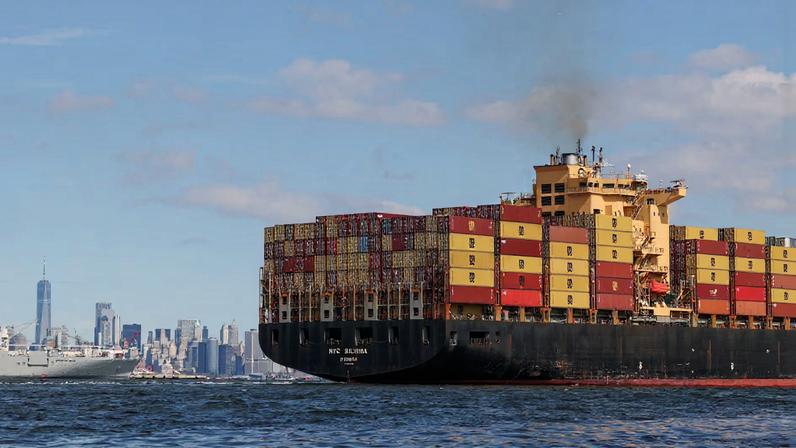 A ship carries shipping containers through Upper Bay in New York, U.S., September 30, 2024. REUTERS/Caitlin Ochs