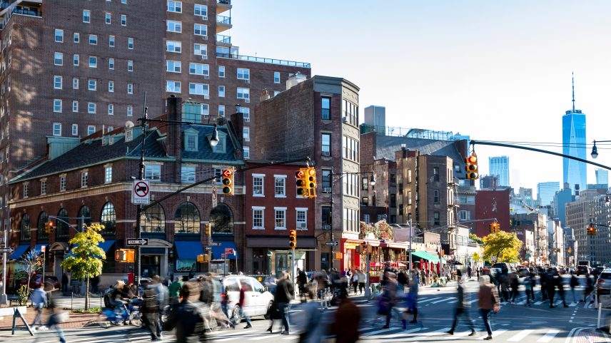 An intersection in New York City with many pedestrians