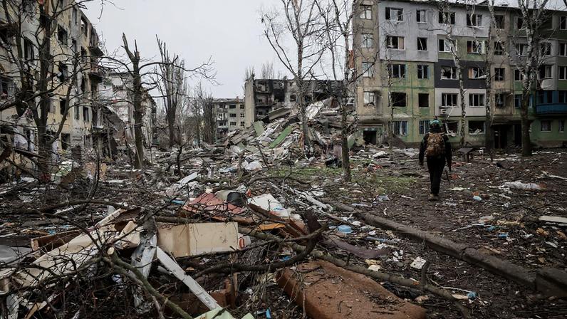 Ukrainian serviceman walks near apartment buildings damaged by Russian military strike, amid Russia's attack on Ukraine, in the frontline town of Kostiantynivka in Donetsk region, Ukraine December 20, 2025. Oleg Petrasiuk/Press Service of the 24th King Danylo Separate Mechanized Brigade of the Ukrainian Armed Forces/Handout via REUTERS