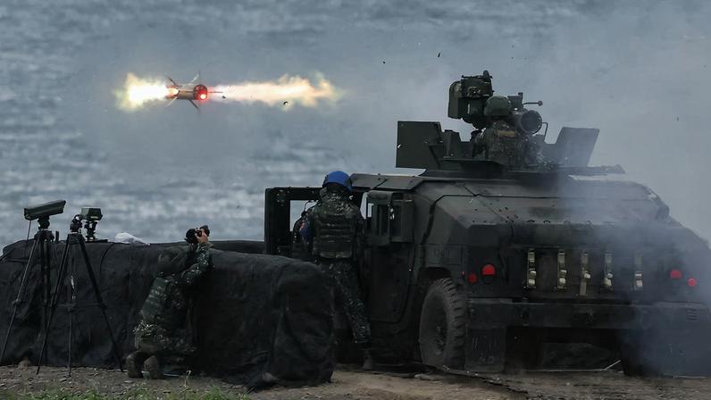 A US-made TOW-2A wire-guided anti-tank missile is launched by Taiwanese soldiers from a M1167 TOW carrier vehicle at the Fangshan training grounds in Pingtung, Taiwan, August 26,2024.