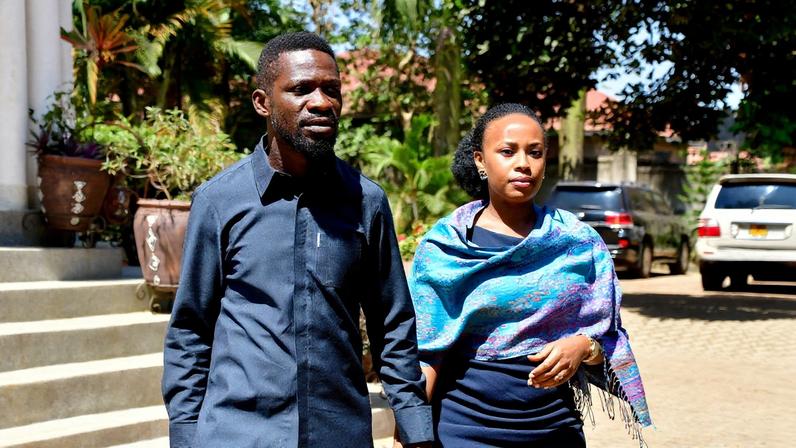 Polls open in Uganda elections as voters are to choose president and parliament, in Kampala