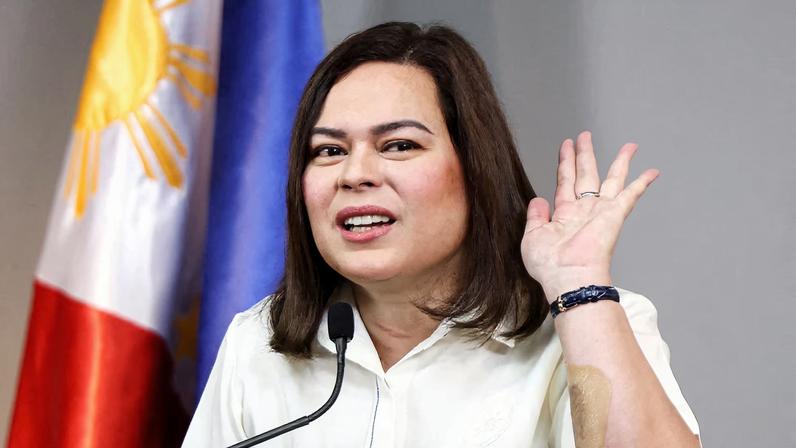 Philippine Vice President Sara Duterte gestures as she delivers a statement following her impeachment by the lower house of the Congress, in her office at Mandaluyong City, Metro Manila, Philippines, February 7, 2025.
