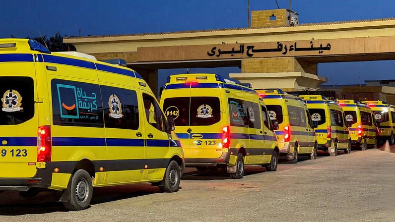 Egyptian ambulances line up to the Gaza Strip through the Rafah border from the Egyptian side, following the first day Israel reopened the border between Gaza and Egypt on Monday for people on foot, in Rafah, Egypt, February 2, 2026. REUTERS/Stringer