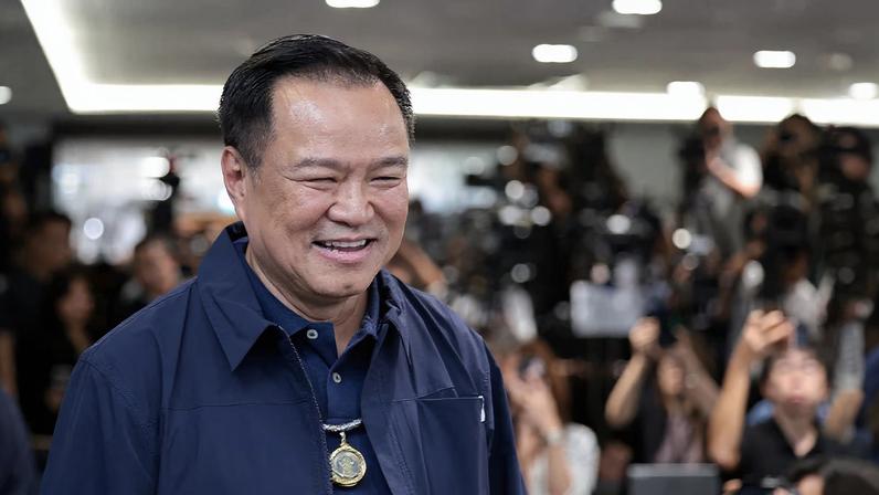Thailand's caretaker Prime Minister Anutin Charnvirakul, Bhumjaithai Party leader and prime ministerial candidate, arrives for a press conference at the party headquarters on the day of the general election, in Bangkok, Thailand, February 8, 2026. REUTERS/Chalinee Thirasupa