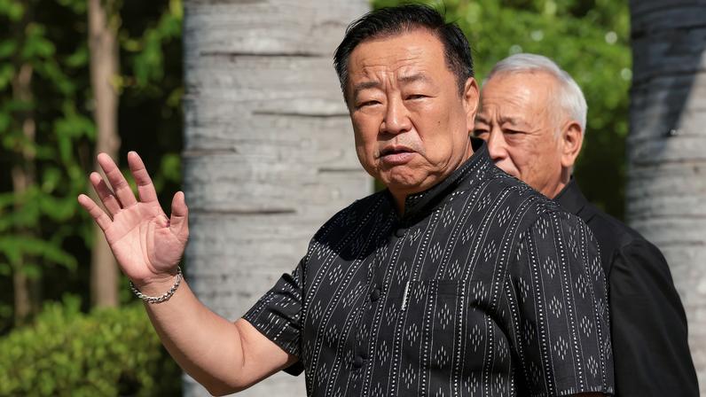 Thailand's caretaker Prime Minister and Bhumjaithai Party leader Anutin Charnvirakul gestures as he walks to attend a cabinet meeting at the Government House after the party won the general election, in Bangkok, Thailand, February 10, 2026.