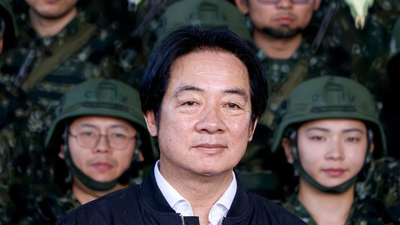 Taiwan President Lai Ching-te inspects reservists during a training session at Loung Te Industrial Parks Service Center in Yilan