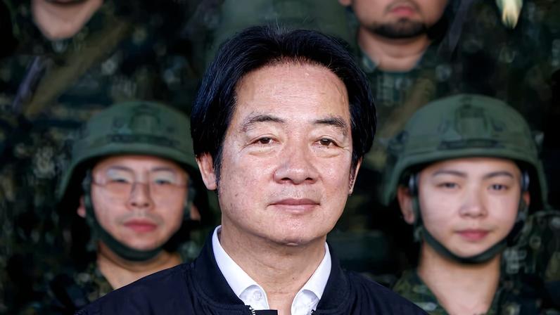 Taiwan President Lai Ching-te inspects reservists during a training session at Loung Te Industrial Parks Service Center in Yilan