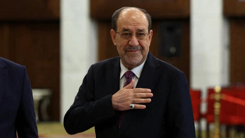 Former Iraqi Prime Minister Nouri al-Maliki reacts at a polling station inside Al-Rasheed Hotel during the parliamentary election in Baghdad, Iraq, November 11, 2025.