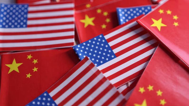 U.S. and Chinese flags are seen in this illustration taken March 20, 2025. REUTERS/Dado Ruvic/Illustration
