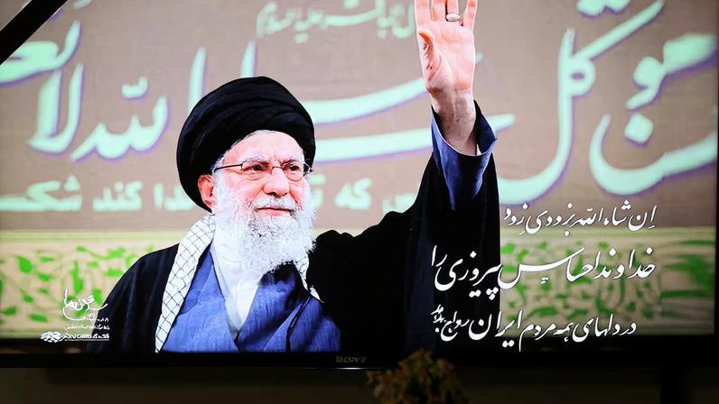 A photo of the late Iranian Supreme Leader Ayatollah Ali Khamenei is shown on TV when the news of his death is announced, in Tehran, Iran March 1, 2026. Majid Asgaripour/WANA (West Asia News Agency) via REUTERS