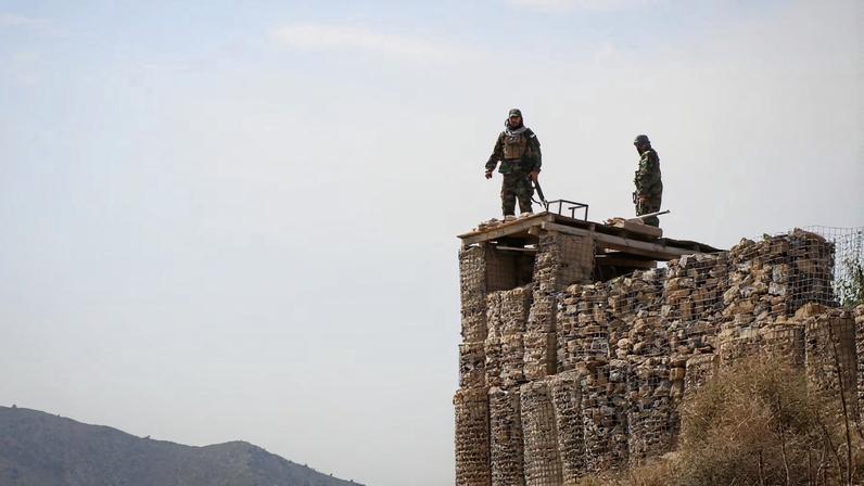 Taliban soldiers stand on top of a their post as they guard near the Pakistan-Afghanistan border, in Khost province, Afghanistan, February 27, 2026. REUTERS/Stringer