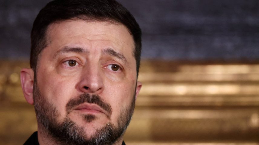 Ukrainian President Volodymyr Zelenskiy looks on as he delivers a statement along with Bavarian federal state prime minister Markus Soeder (not pictured), chairman of the Munich Security Conference Wolfgang Ischinger (not pictured), Polish Prime Minister Donald Tusk (not pictured) during the Munich Security Conference MSC, at the Residenz of the former Bavarian Kings, in Munich, Germany, February 14, 2026. REUTERS/Liesa Johannssen/File Photo