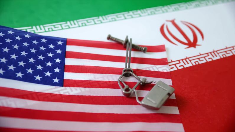 U.S. and Iran flags are seen in this illustration taken June 18, 2025. REUTERS/Dado Ruvic/Illustration/File Photo