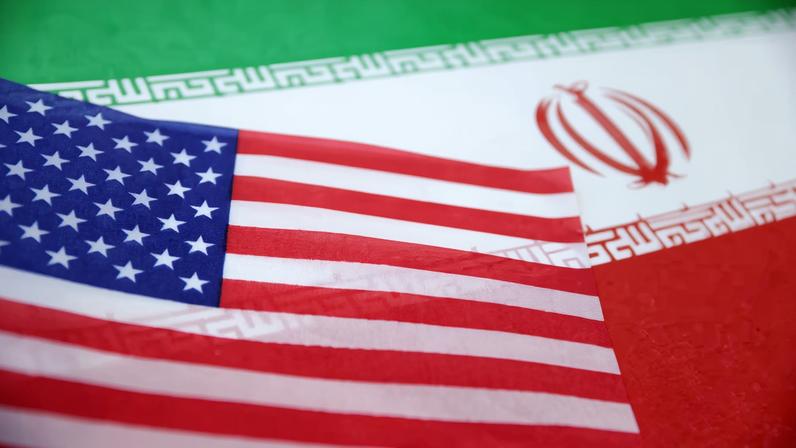 U.S. and Iran flags are seen in this illustration taken June 18, 2025. REUTERS/Dado Ruvic/Illustration