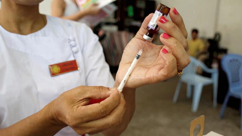 A nurse prepares a measles-rubella vaccine in Yangon, Myanmar, November 26, 2019. REUTERS/Ann Wang