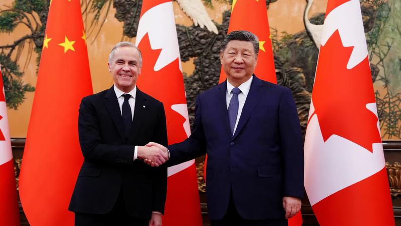 Canadian Prime Minister Mark Carney shakes hands with President of China Xi Jinping at the Great Hall of the People in Beijing, China on Friday, Jan. 16, 2026. Sean Kilpatrick/Pool via REUTERS
