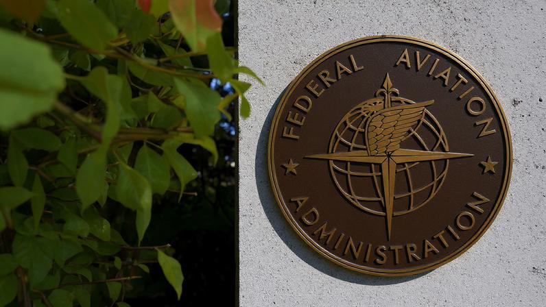 A sign marks the Federal Aviation Administration's (FAA) Boston Air Route Traffic Control Center, in Nashua, New Hampshire, U.S., October 9, 2025. REUTERS/Brian Snyder