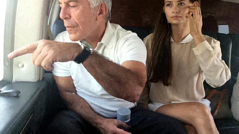 Late financier and convicted sex offender Jeffrey Epstein appears with a woman, whose identity has been obscured, in this image from the Epstein estate released by House Oversight Committee Democrats