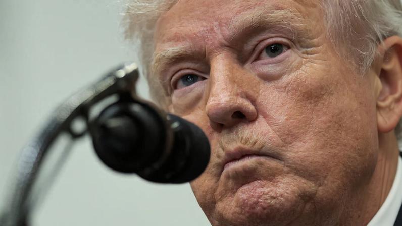 U.S. President Donald Trump makes an announcement at the White House in Washington, D.C., U.S., February 12, 2026. REUTERS/Jonathan Ernst/File Photo