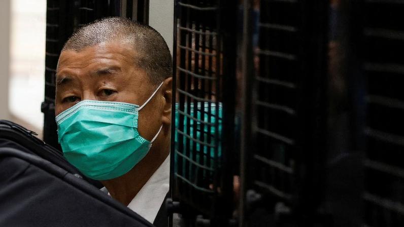 FILE PHOTO: Media mogul Jimmy Lai, founder of Apple Daily, arrives the Court of Final Appeal by prison van in Hong Kong